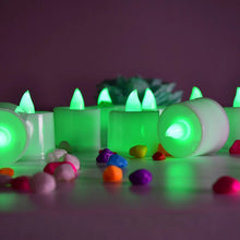 Close-up of green LED tealight candle