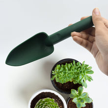 Mini heavy-duty gardening tool, hand trowel for digging and planting.