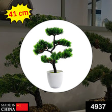 Artificial potted plant with green foliage