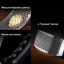 Ergonomic stainless steel garlic presser for kitchen use.