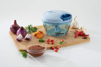 manual vegetable chopper with stainless steel blades.