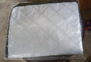 Aluminum foil cover for small air conditioners, protects from dust and weather.